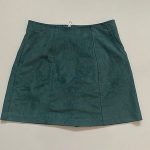 Teal A-line mini suede skirt with pockets. From Kendall & Kylie collection